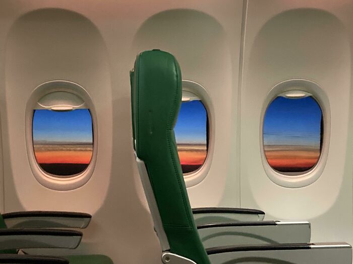 ITAP Of The Sunset Inside An Almost Empty Plane