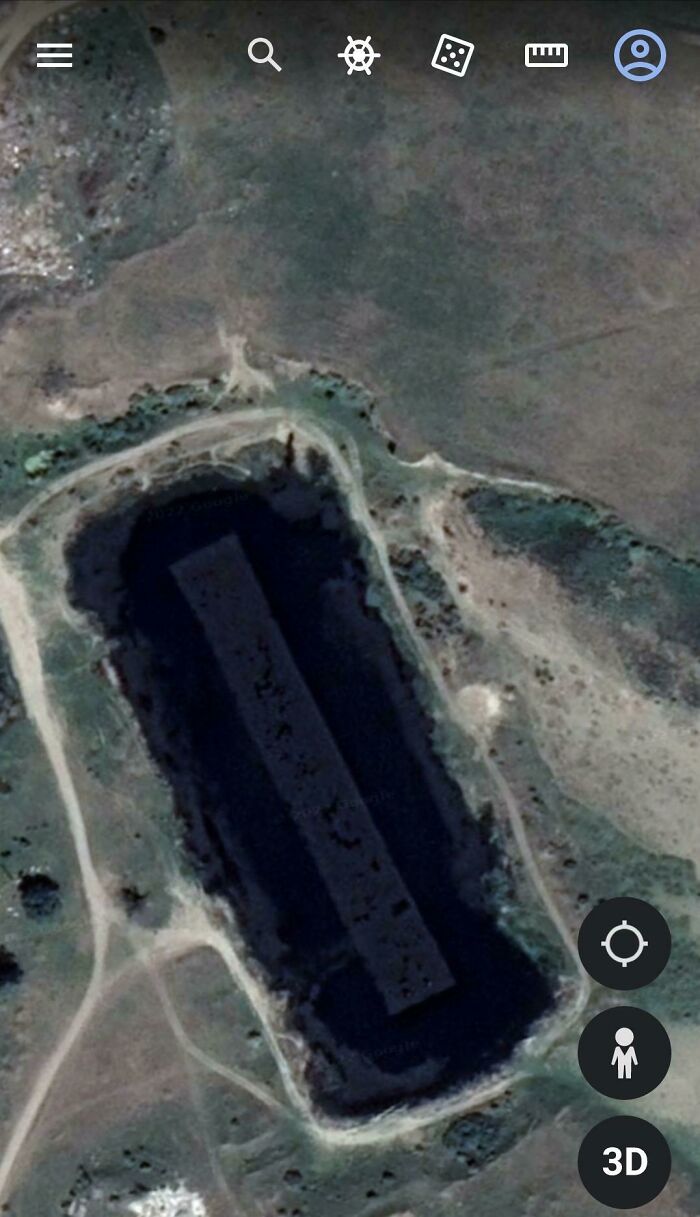 This Small Lake In My Town Has A Max Depth Of About 18 Meters. In The Middle There's A Large Sloping Cement Board, Held By 2 Metal Pillars