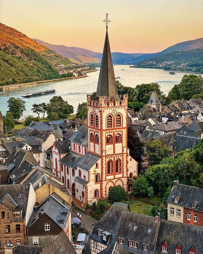 The Late Romanesque Saint Peter’s Evangelical Church, Originally Built In The 13th Century And Renovated In The 19th Century, Towering Over The Town Of Bacharach, Mainz-Bingen, Rhineland-Palatinate, Germany