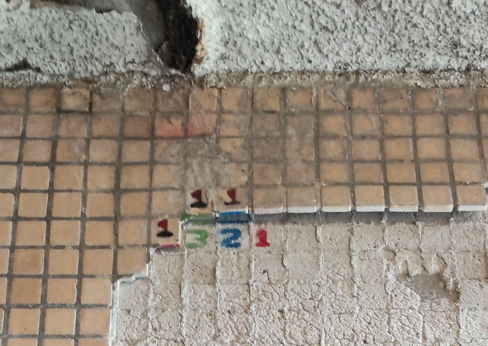 Some Of The Old Tiles In The Underpass Fell Off