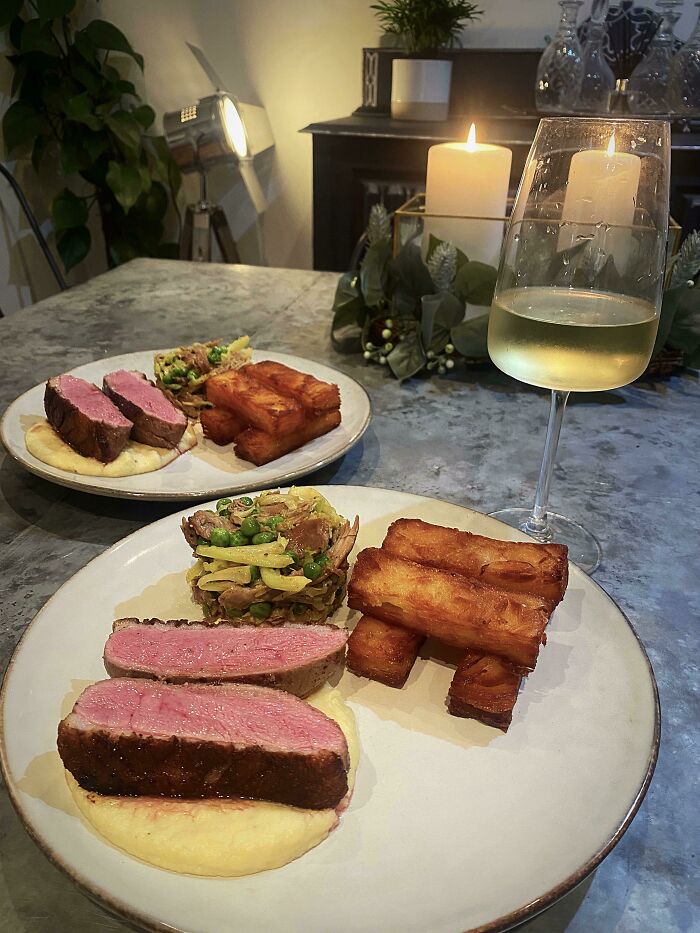 Sous Vide Duck Breast On Top Of Parsnip Purée With Duck Leg, Savoy Cabbage And Peas With 15 Hour Chips And Duck Gravy