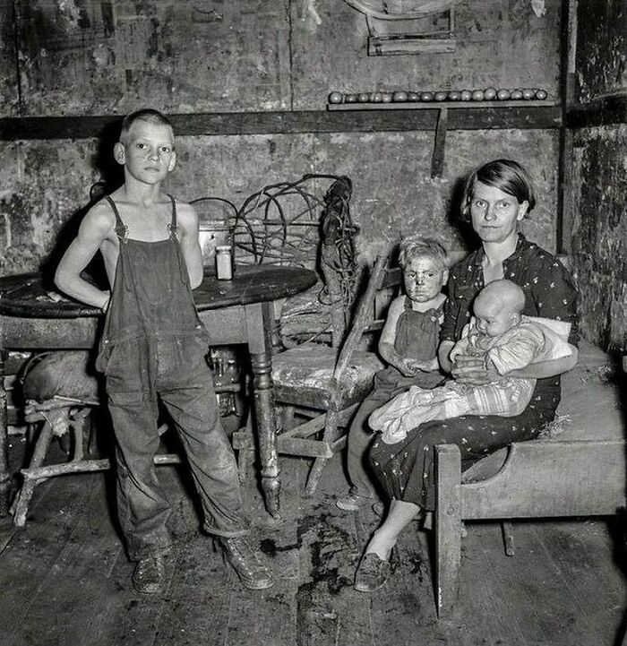 Coal Miner's Wife And Three Of Their Children. West Virginia, USA. Septemper 1938. Photo By: Marion Post Wolcott