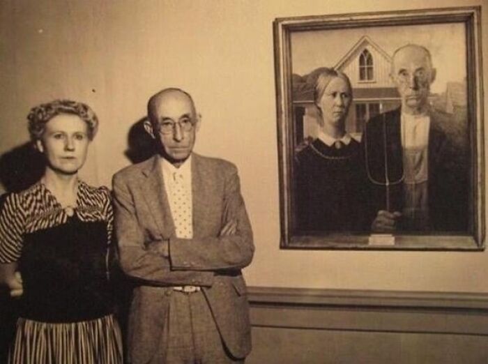 The Models Of “American Gothic” Stand Next To The Painting (1942)