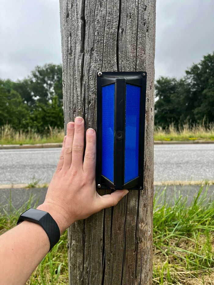 What Are These Blue Reflecting Markers For? Mounted On A Pole, Facing The Field