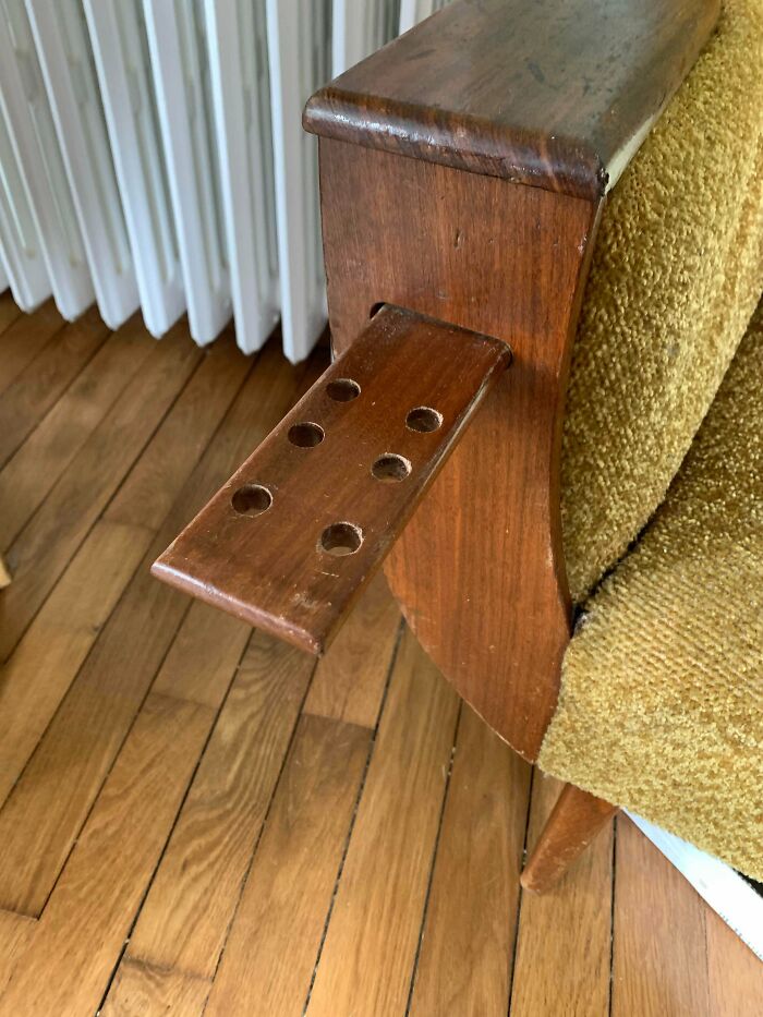 Sliding Tray With Holes On Both Sides Of This Sofa