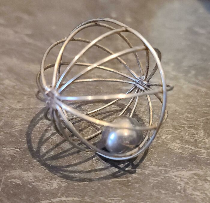 It's Just A Little Cage With A Sphere, 3-4cm. I Don't Know If It's Use To Clean Something Or To Avoid Bubbles In Hot Liquids, Like Milk Or What, Can You Help Me ?