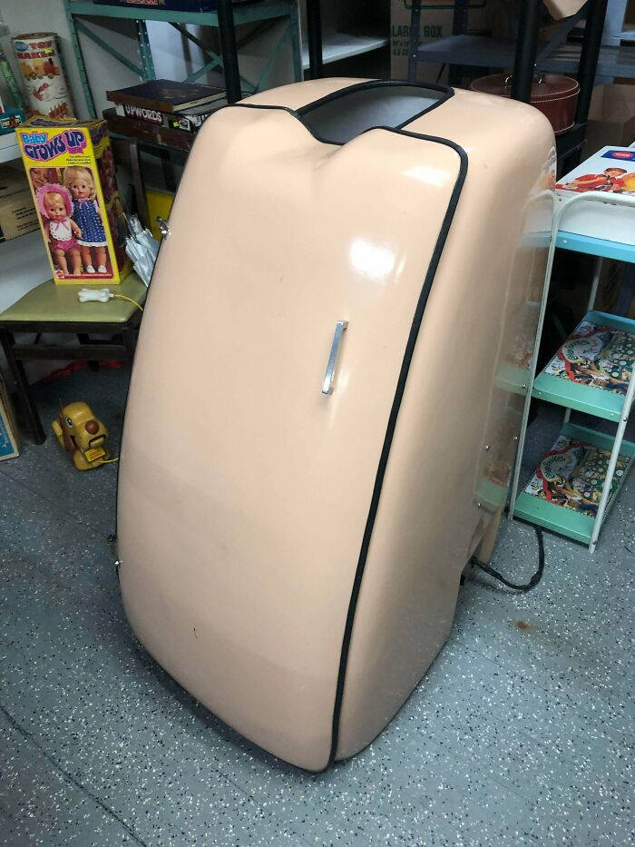 Almost Looks Like A Fridge With A Seat In It, And An Opening For Your Head?? About 4 Or 5 Feet Tall I Think