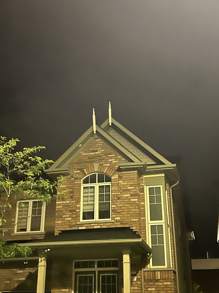 Around Half The Houses On My Street Have These White Posts On The Tip Of Their Roofs, What Do They Signify? (Brampton, Ontario For Reference)