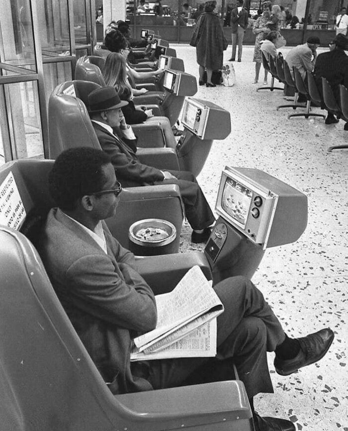 Coin-Operated “Tel-A-Chairs” In The Los Angeles Greyhound Bus Terminal. Ashtrays Also Included. 1969
