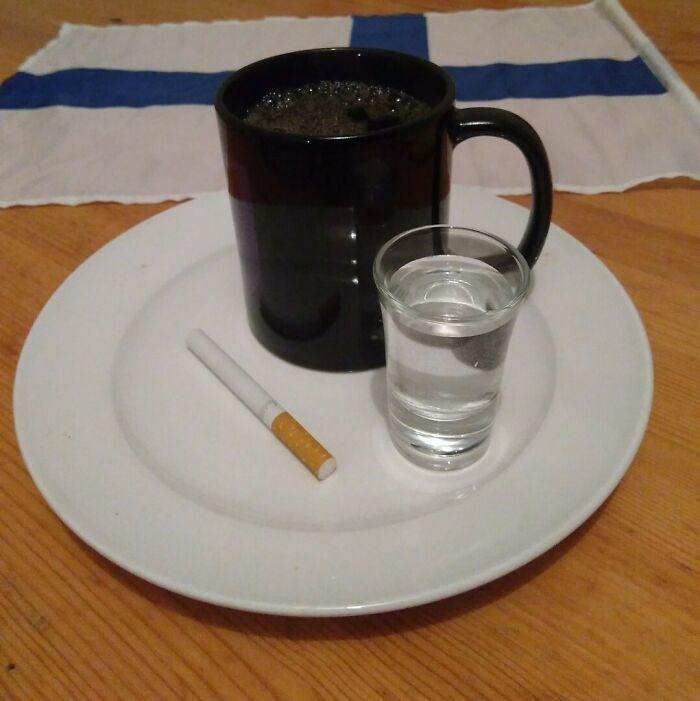 Blörö - The Famous Finnish Breakfast Consisting Of Hot Coffee, Vodka, And A Cigarette