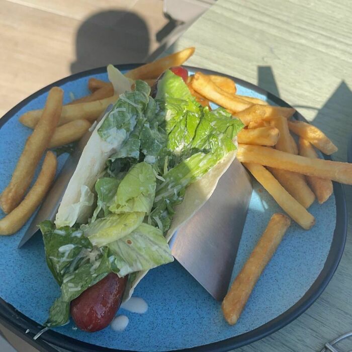 Told The Waiter To Surprise Me… Caesar Salad Topped Hot Dog With Cheetos On A Tortilla