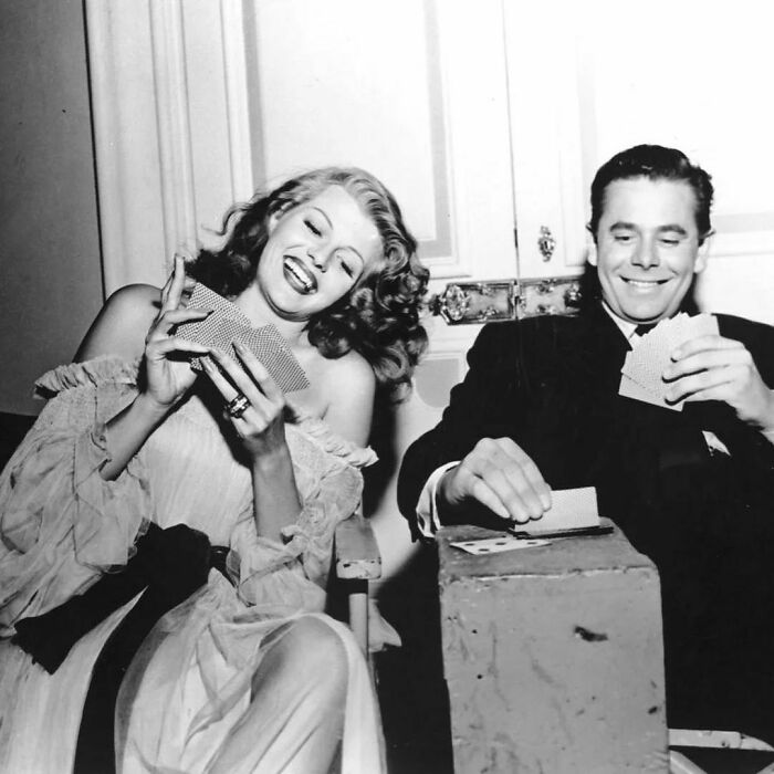Rita Hayworth And Glenn Ford Playing A Game Of Cards On The Set Of Gilda, 1946