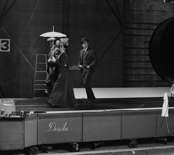 Robert Redford, Katharine Ross, And Paul Newman On A Conveyor Belt For The Filming Of A Process Shot During Production Of Butch Cassidy And The Sundance Kid, 1969