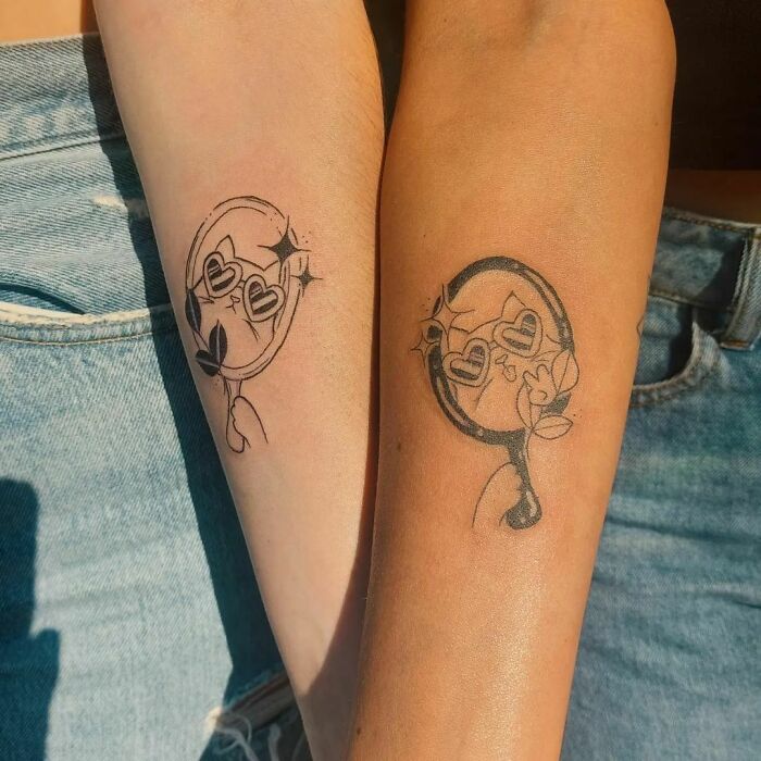 Cool matching cats arm tattoos