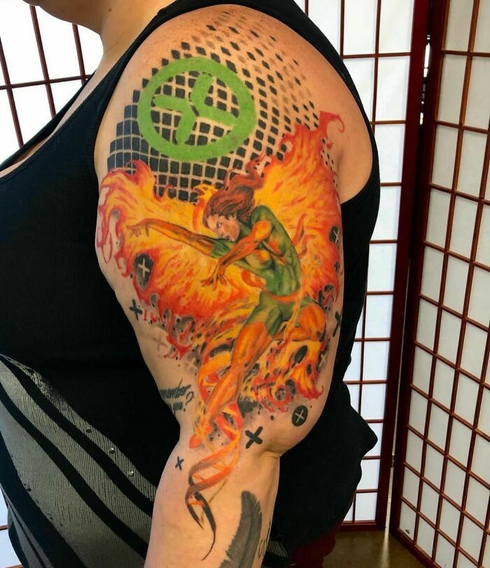 Pheonix with fire wings tattoo