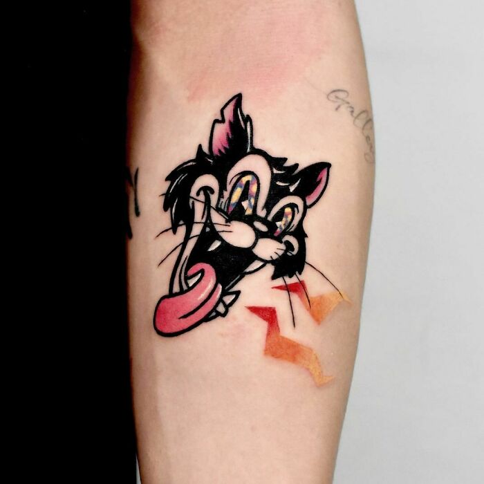 Butch Cat arm tattoo