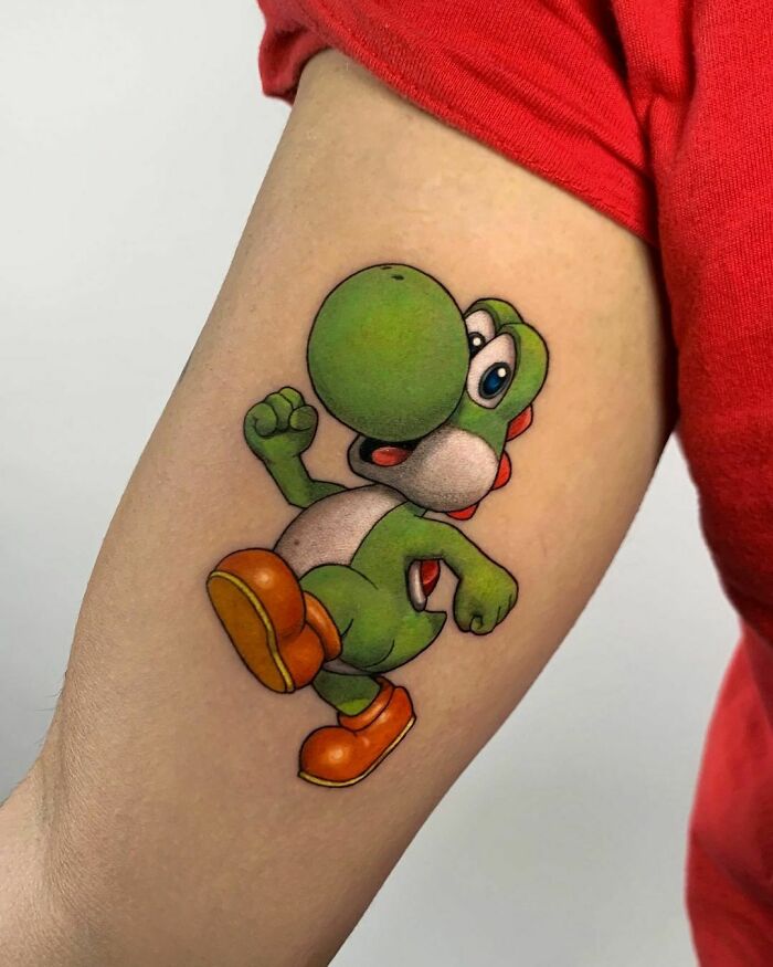 Yoshi arm tattoo