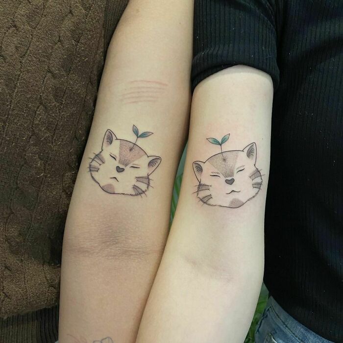 Matching sleepy kitties tattoos