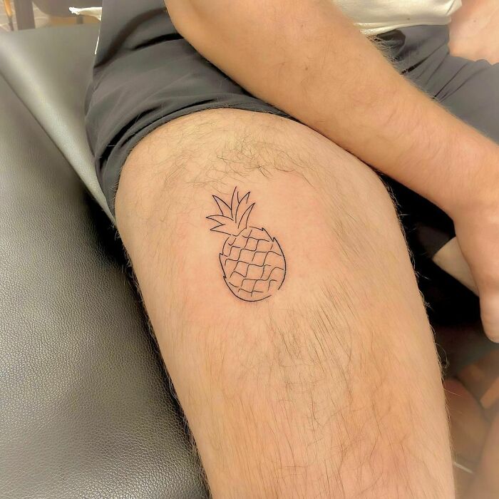 minimalistic tattoo of a pineapple