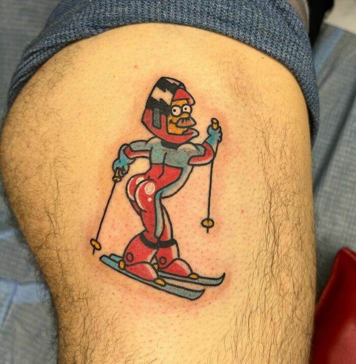 Flanders from The Simpsons tattoo