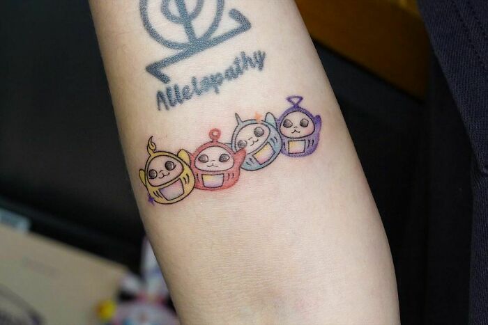 Cute Teletubbies arm tattoo