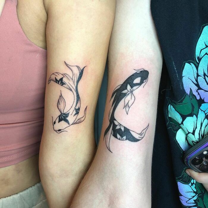 Matching Koi fish tattoos