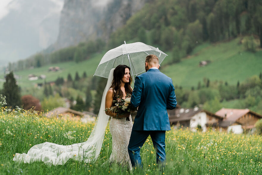 Wet, Spring Wedding Surrounded By Wildflowers