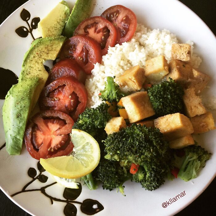Tofu Broccoli And Rice With Sliced Tomatos And Avocados