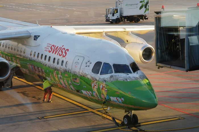Painted Swiss Plane In An Airport 