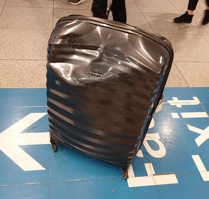 Just Curious Norwegian Airlines Why Does My Suitcase Look Like It's Spent The Entirety Of Its Journey In Your Plane Getting Battered By Football Hooligans?