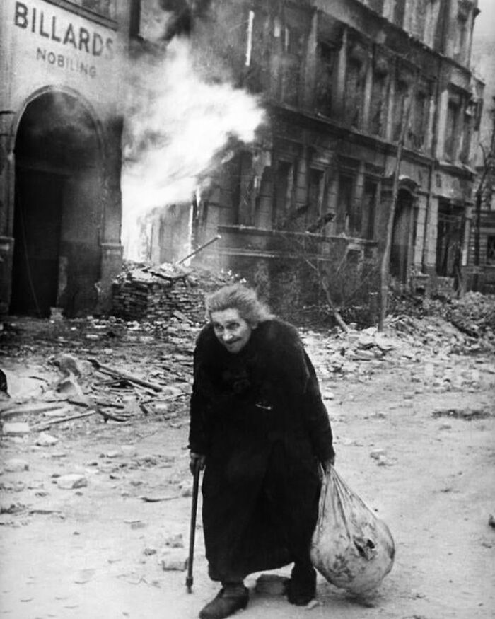 A Woman Walks Through Berlin During The Battle Of Berlin, May 1945
