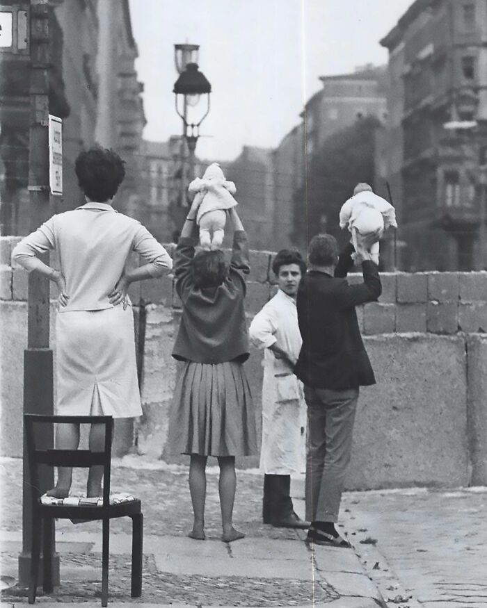 Residents Of West Berlin Show Their Children To Their Grandparents Living In East Berlin, 1961