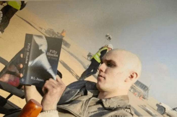 Nicholas Hoult Catches Up On His Reading While On Location For Mad Max: Fury Road (2015)