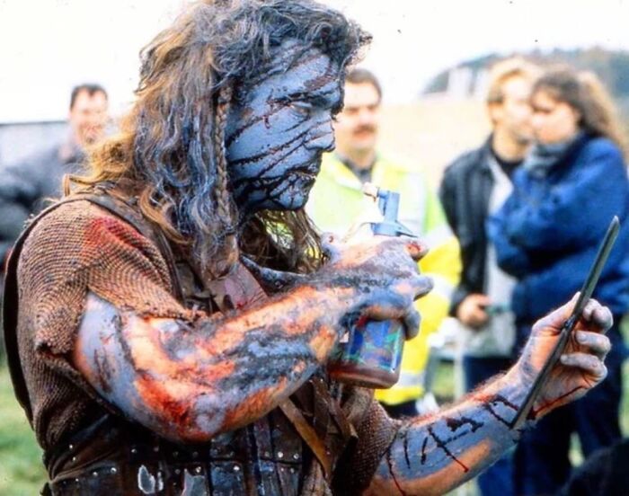 Mel Gibson Checking His Make Up For Braveheart