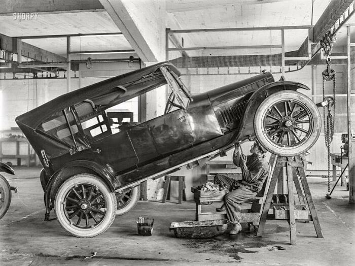 Studebaker Motor Car In Repair Shop With Garage Mechanic. San Francisco, 1915