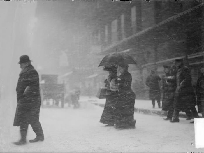 Two Women Crossing The Street During A Blizzard, New York, 1903