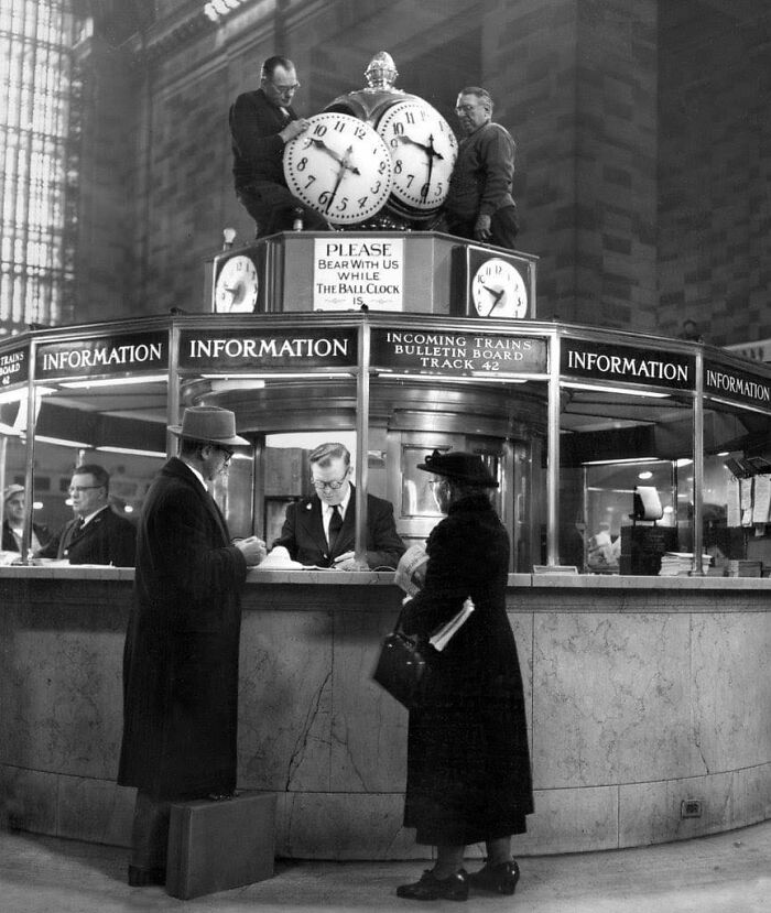 Workers Reinstall Clock At The Information Booth In Grand Central, New York, 1954