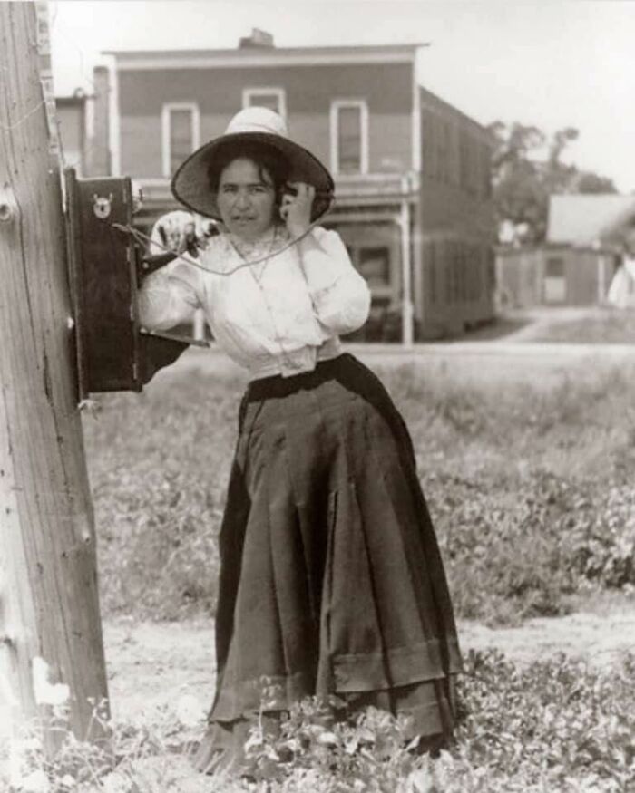 Woman Talking On A Hand Crank, Oak Telephone, 1900s