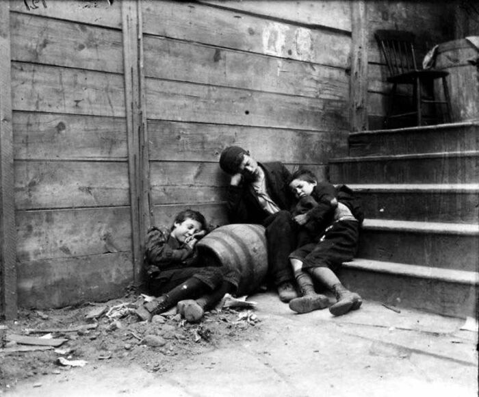 Three Homeless Boys Sleep On A Stairway In A Lower East Side Alley, New York, 1890s
