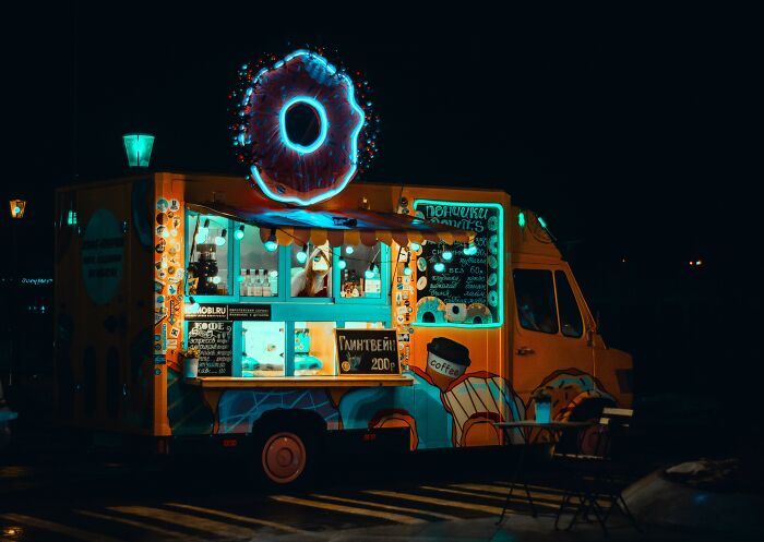 Donut Food Truck In The Dark Evening 
