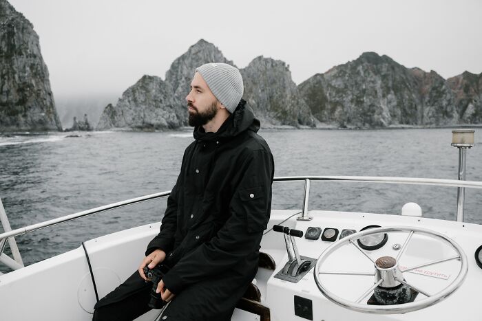 Men Thinking While Being On A Boat 