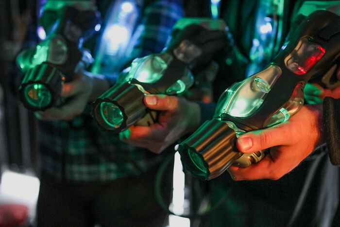 Friend Group Playing Laser Tag 