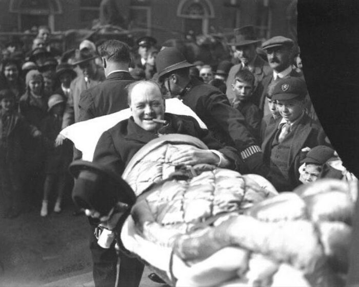 Winston Churchill Is Carried From A Nursing Home Following Being Struck By A Car In New York City