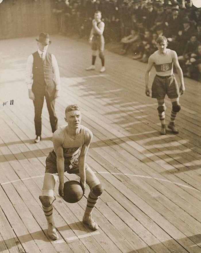 American High School Basketball Player Shooting A Free Throw In 1921