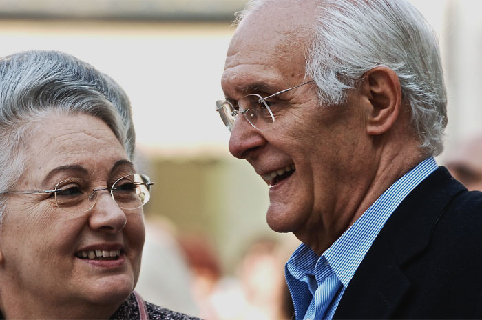 Two old person looking and smiling