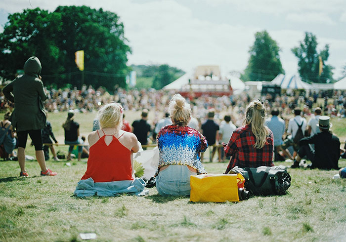 Person sitting at festival