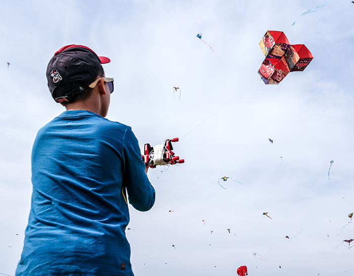 Kid flying a kite