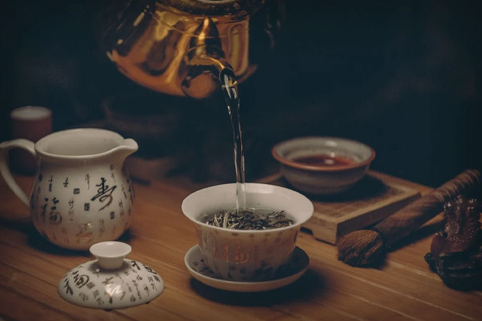 Tea ceremony on wooden table 