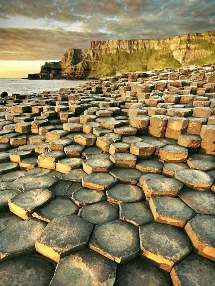 Amazing Ancient Wonder: The Giant's Causeway In Co Antrim Consists Of More Than 40,000 Hexagonal Basalt Columns Which Were Formed When Magma Spurted Through Cracks In The Earth's Surface 60 Million Years Ago