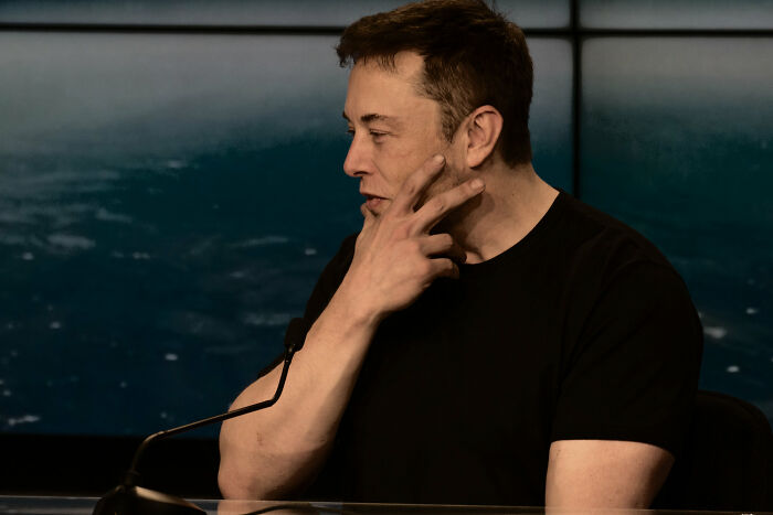 Elon wearing black shirt 